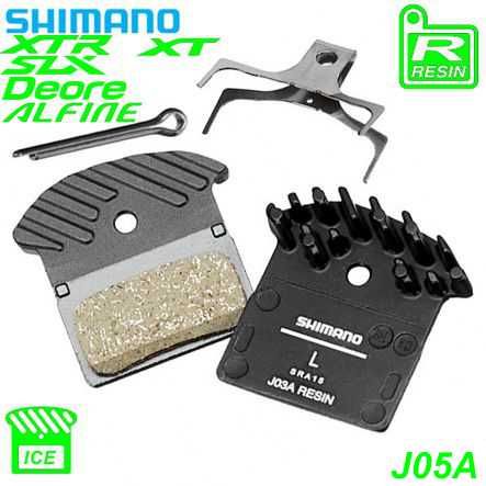 Shimano Bremsbeläge J05A Resin mit Lamellen  Feder  Clip Paar Blister