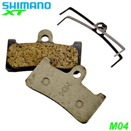 Shimano Bremsbeläge M04 Kunstharz mit Feder und Clip Paar Blister